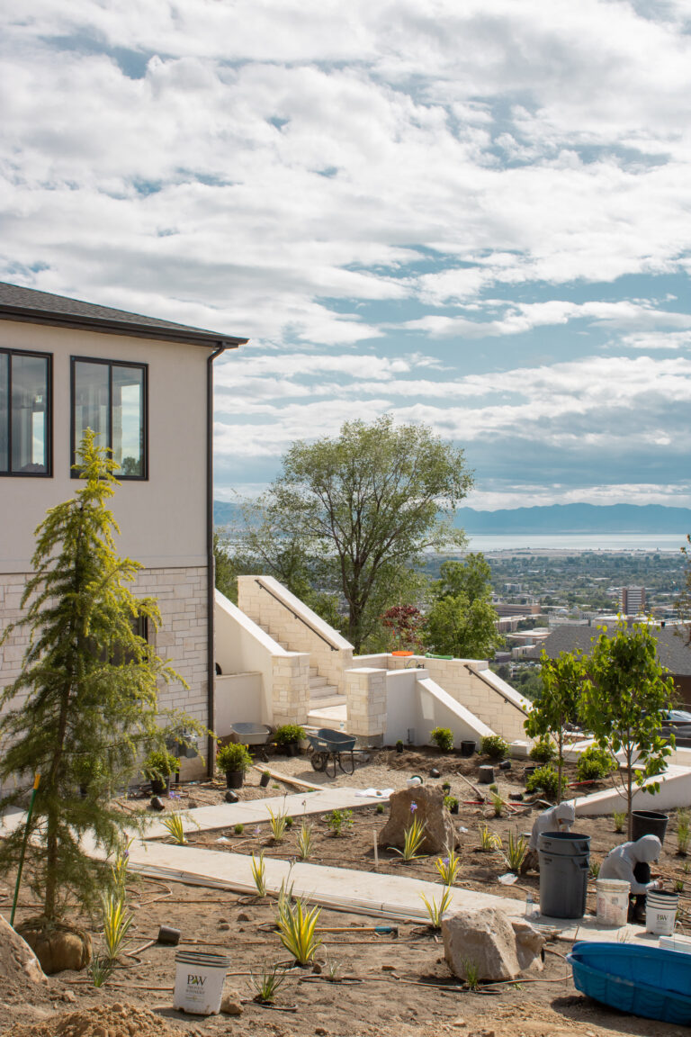 As seen in the 2025 Utah Valley Parade of Homes, this 13-tiered planter bed retaining wall stands as a testament to modern landscaping excellence. Its design not only supports the terrain but also creates a captivating garden feature.