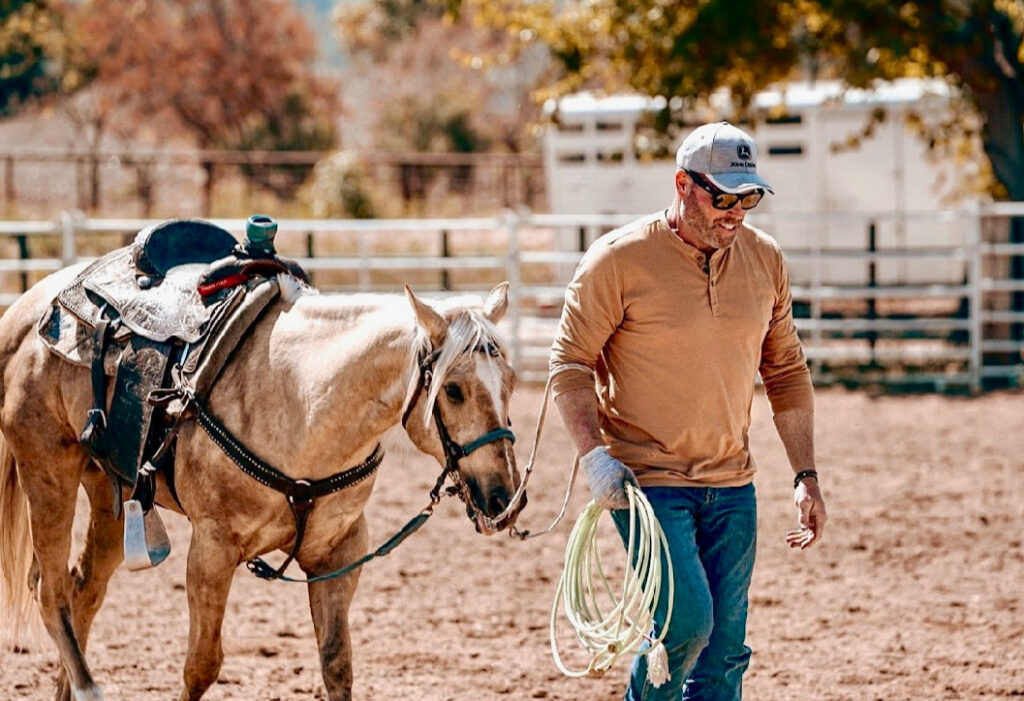 Andrew Hicks on his ranch doing what he loves best!