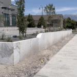 EPS foam blocks stacked and shaped on-site as part of Saratoga Springs retaining wall project