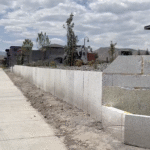 Installed EPS foam retaining wall awaiting stucco finish in Utah commercial project