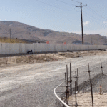 Foam block retaining walls installed in stages at commercial housing site in Grantsville